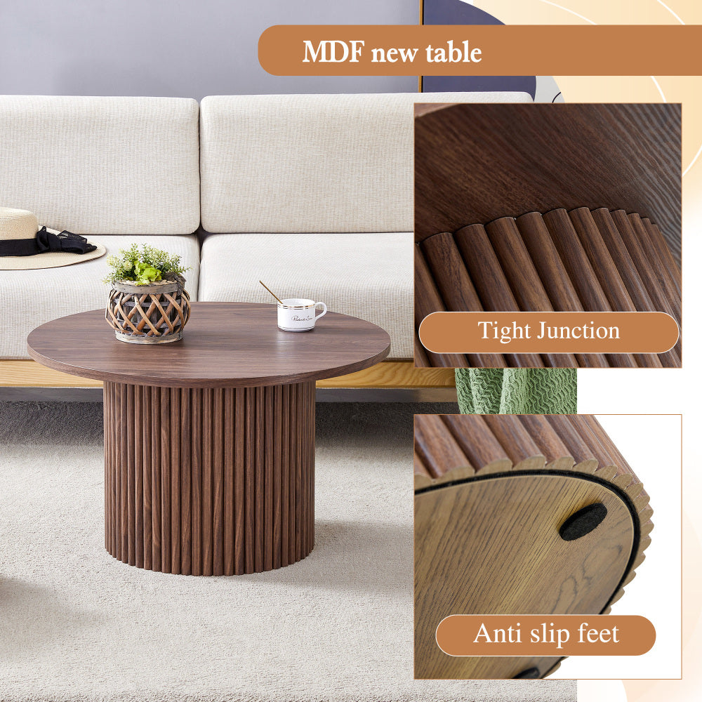 A modern circular coffee table with a diameter of 27.5 inches interprets home aesthetics and practicality. MDF material,cylindrical table leg design.Becoming the visual focal point of home decoration.