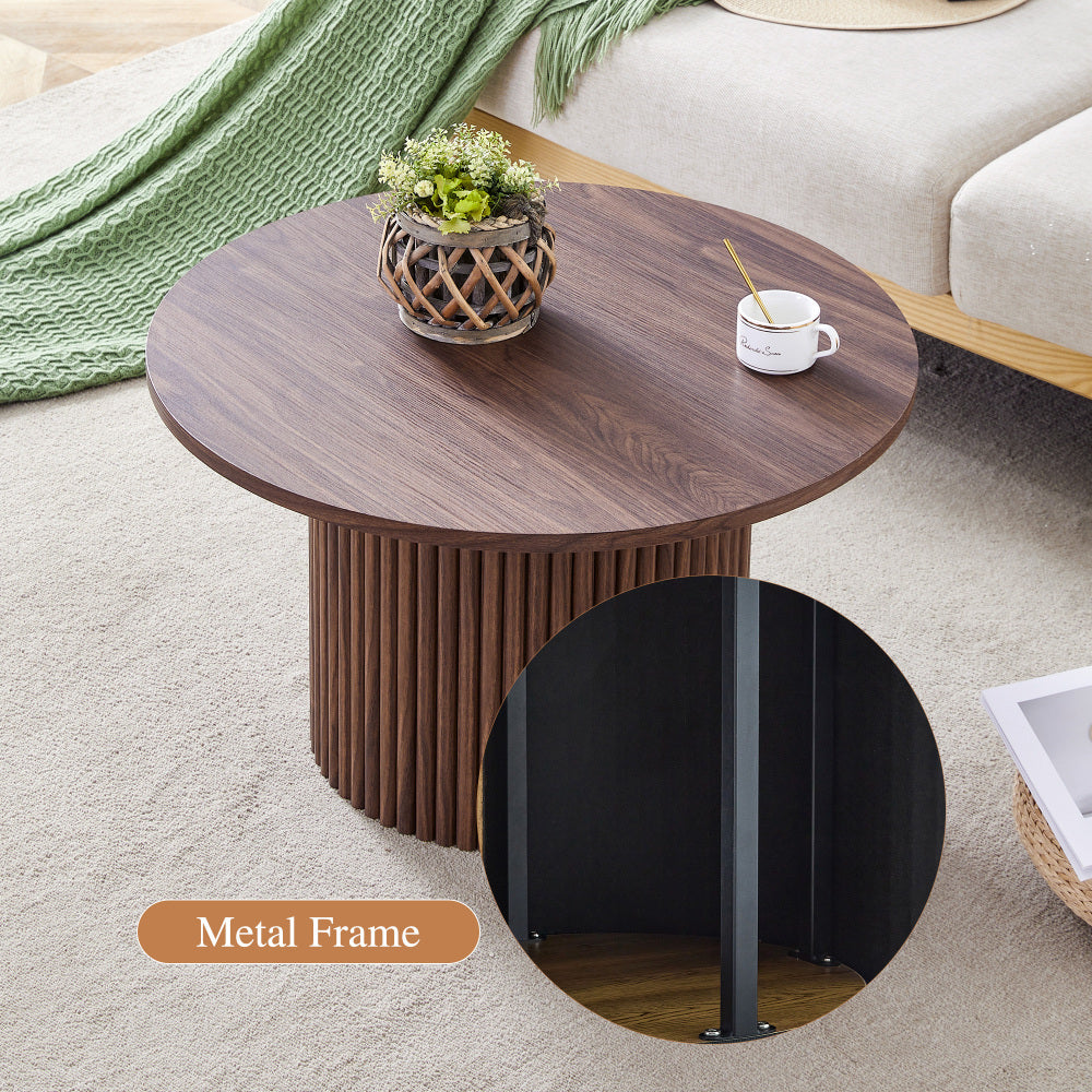 A modern circular coffee table with a diameter of 27.5 inches interprets home aesthetics and practicality. MDF material,cylindrical table leg design.Becoming the visual focal point of home decoration.